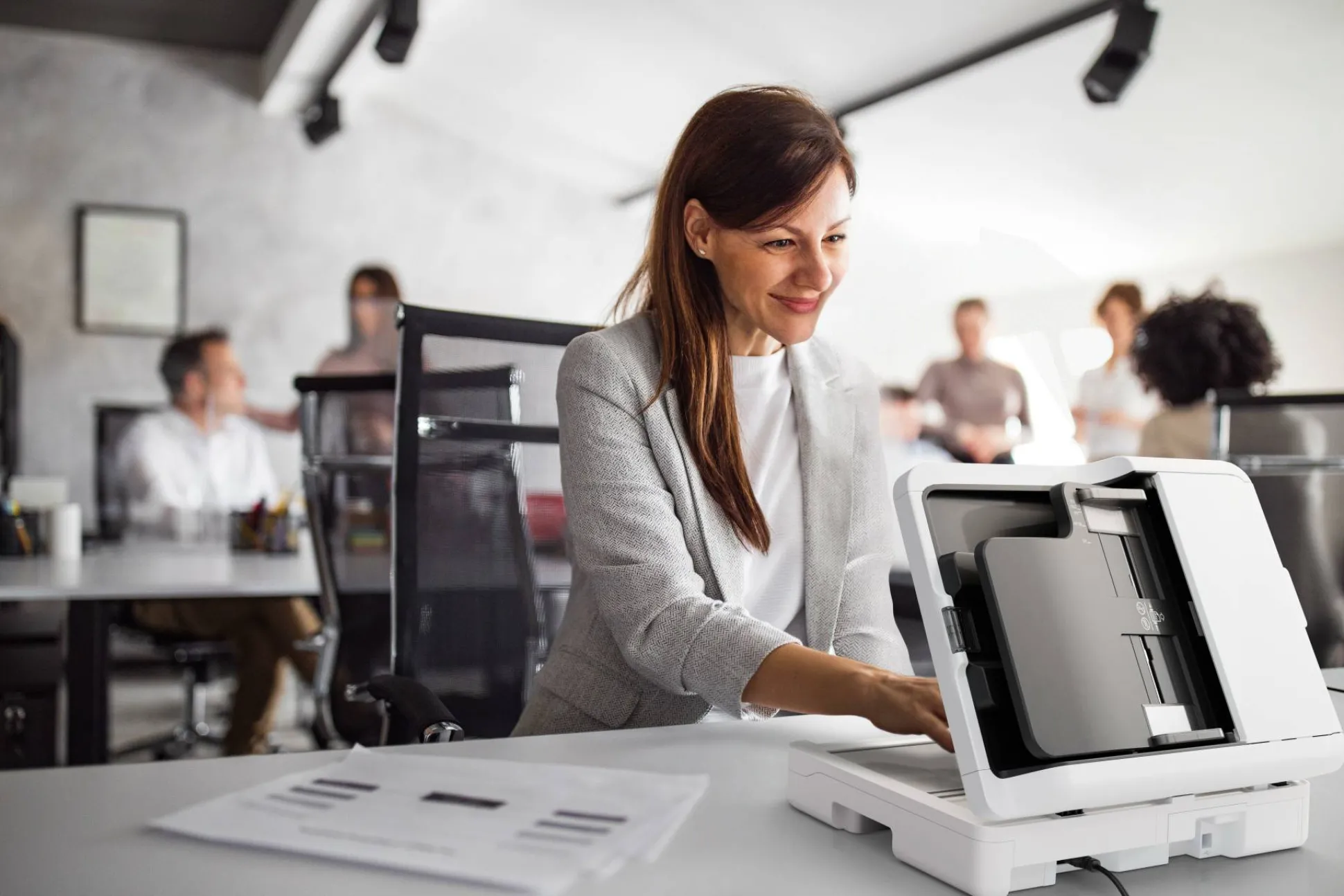 Scanner à plat compact WorkForce DS-1730 pour les petites entreprises et les bureaux à domicile.